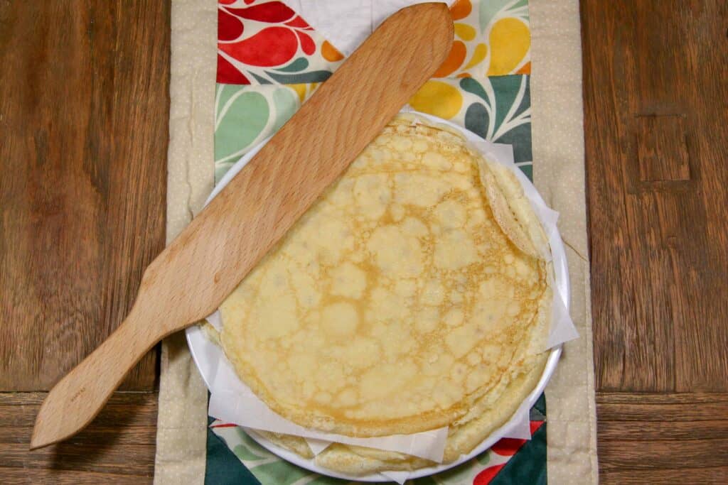 stack of crepes with crepe flipper