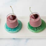 two cherry chia seed smoothies in shot glasses