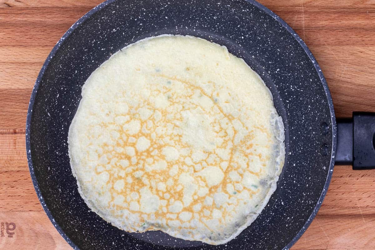 crepe after being flipped to second side in skillet