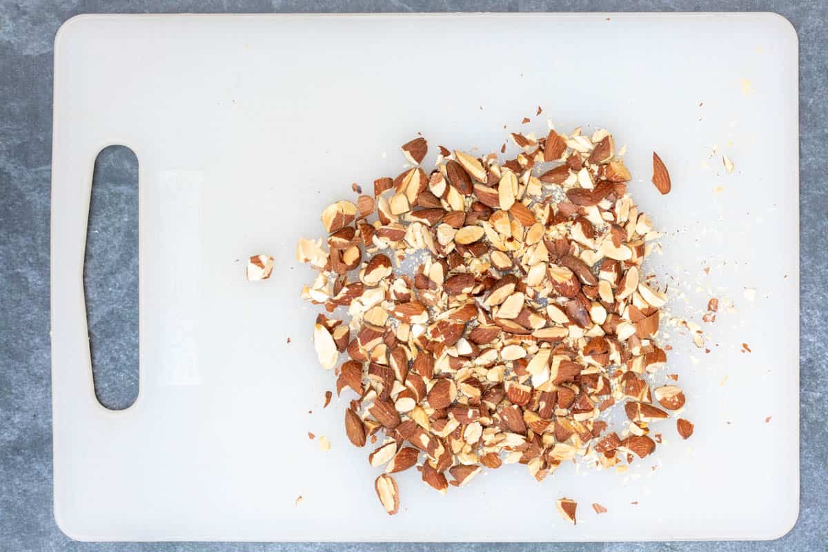 chopped almonds on cutting board