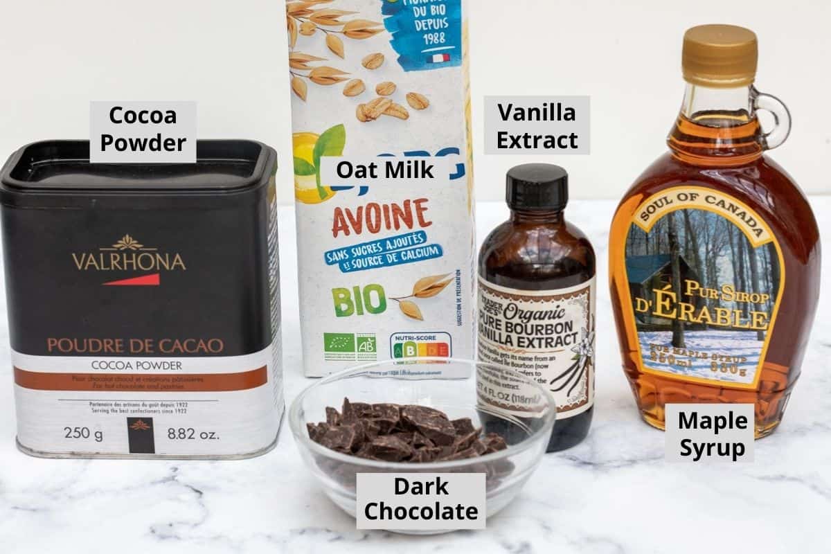 cocoa powder, dark chocolate, oat milk, vanilla extract, and maple syrup