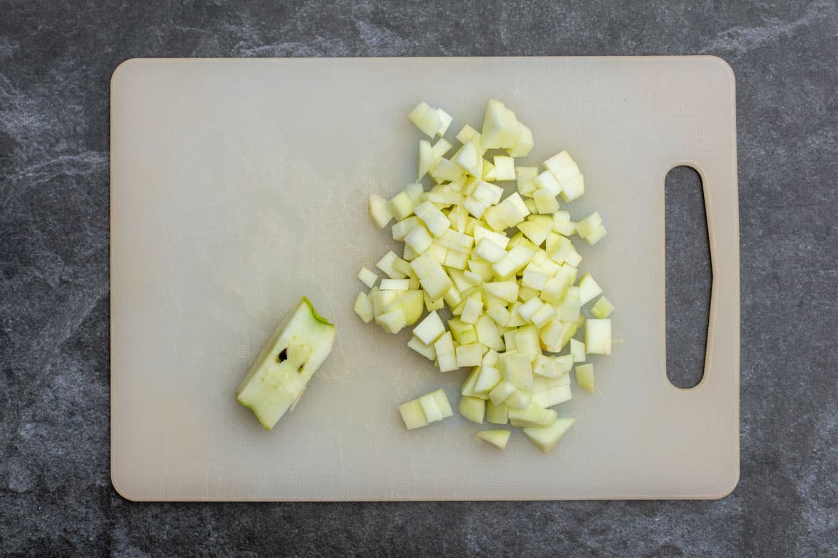 chopped apples on cutting board