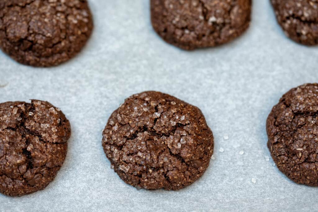 baked almond flour chocolate cookies on sheet pan