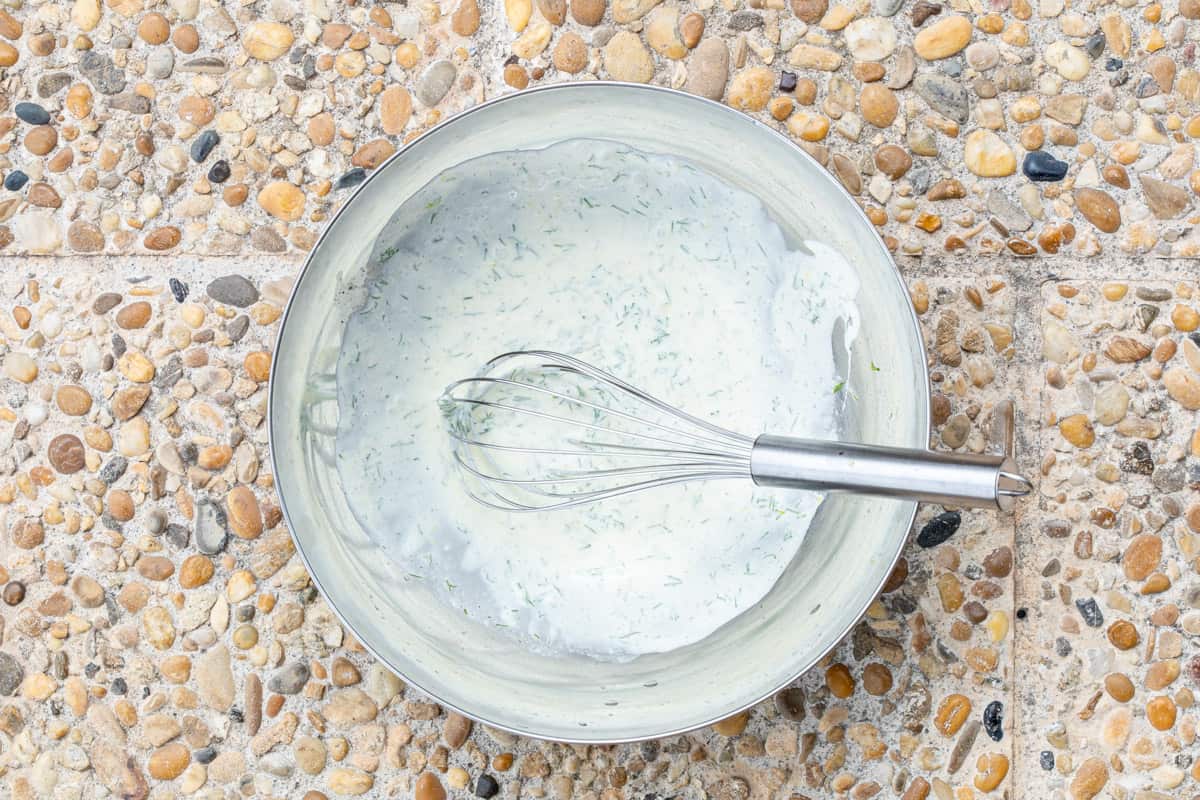 creamy dill dressing in mixing bowl