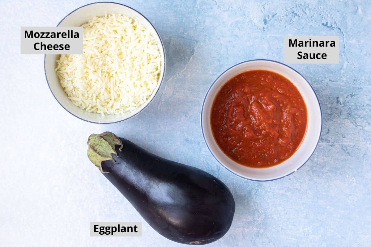 eggplant and bowls of mozzarella cheese and marinara sauce