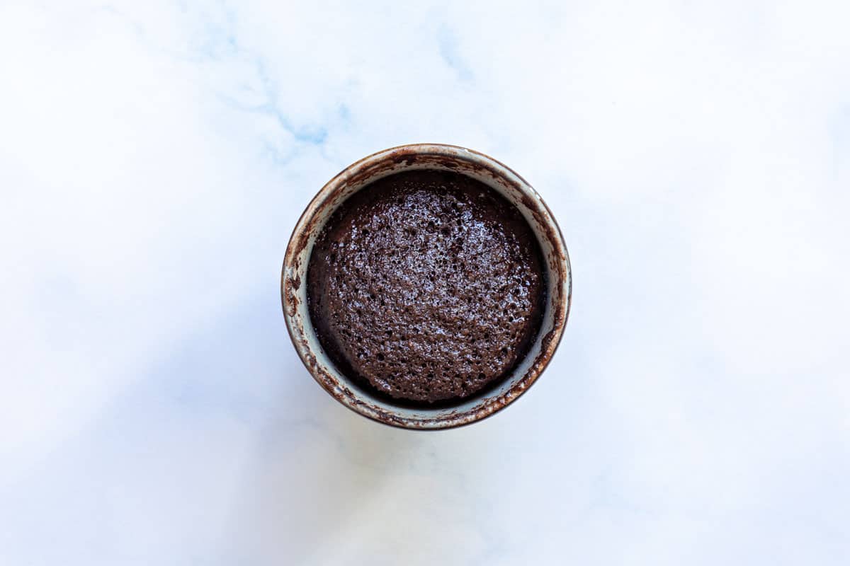 baked chocolate almond flour mug cake in mug