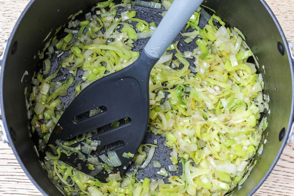 Sautéed leeks, onions, garlic, and miso for vegan potato leek soup