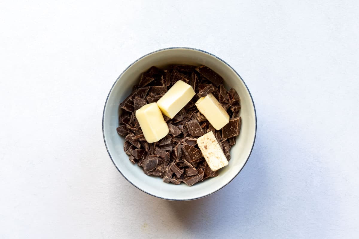 chopped chocolate and butter in bowl