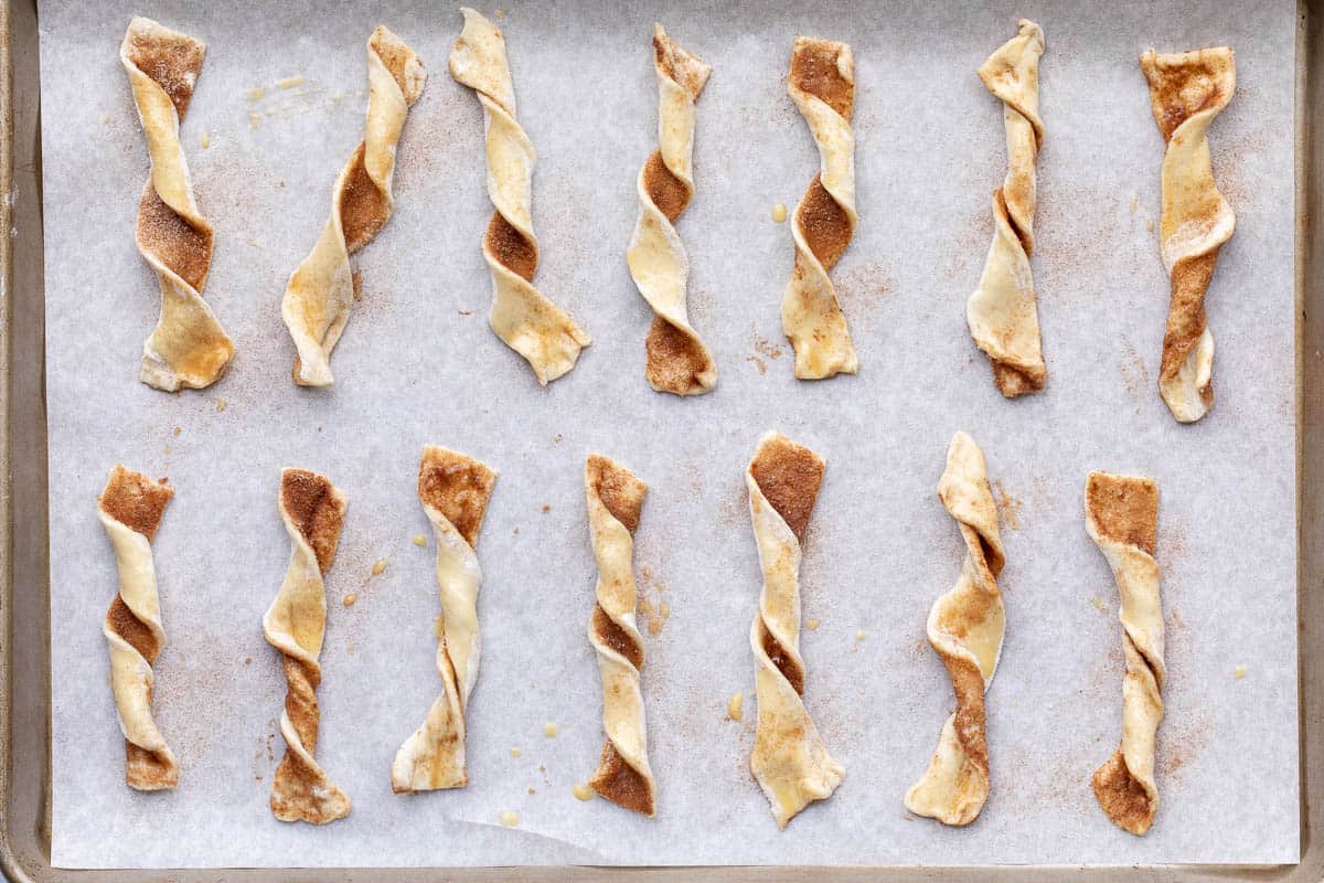 puff pastry cinnamon twists on sheet pan before baking