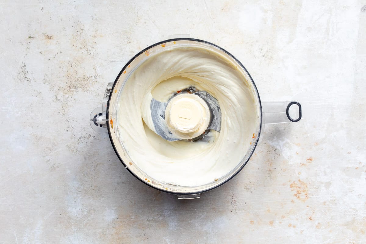 blended cream cheese and creme fraiche in food processor bowl