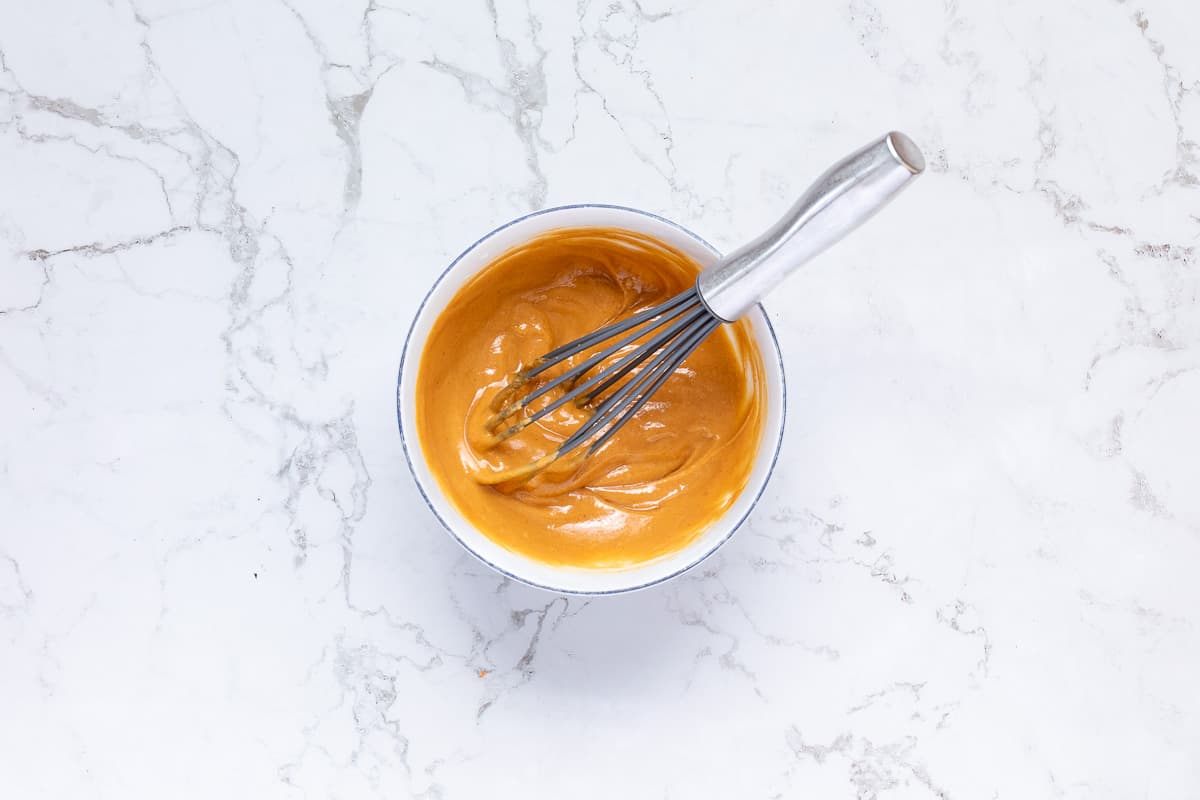 peanut sauce in small bowl with whisk.