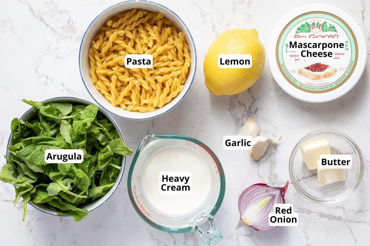 arugula, pasta, heavy cream, lemon, garlic, mascarpone cheese, red onion, and butter.