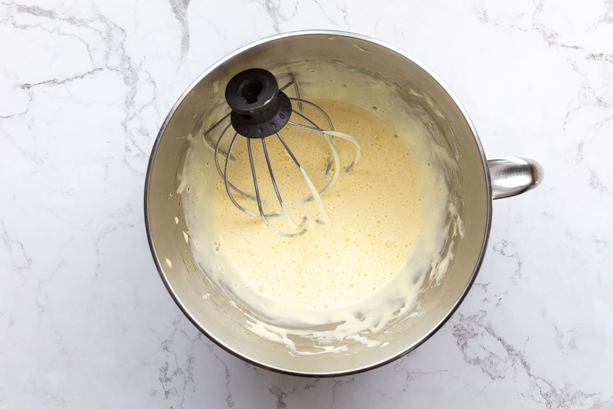 whipped eggs and sugar with milk/cornstarch mixture added to mixer bowl with whisk attachment.
