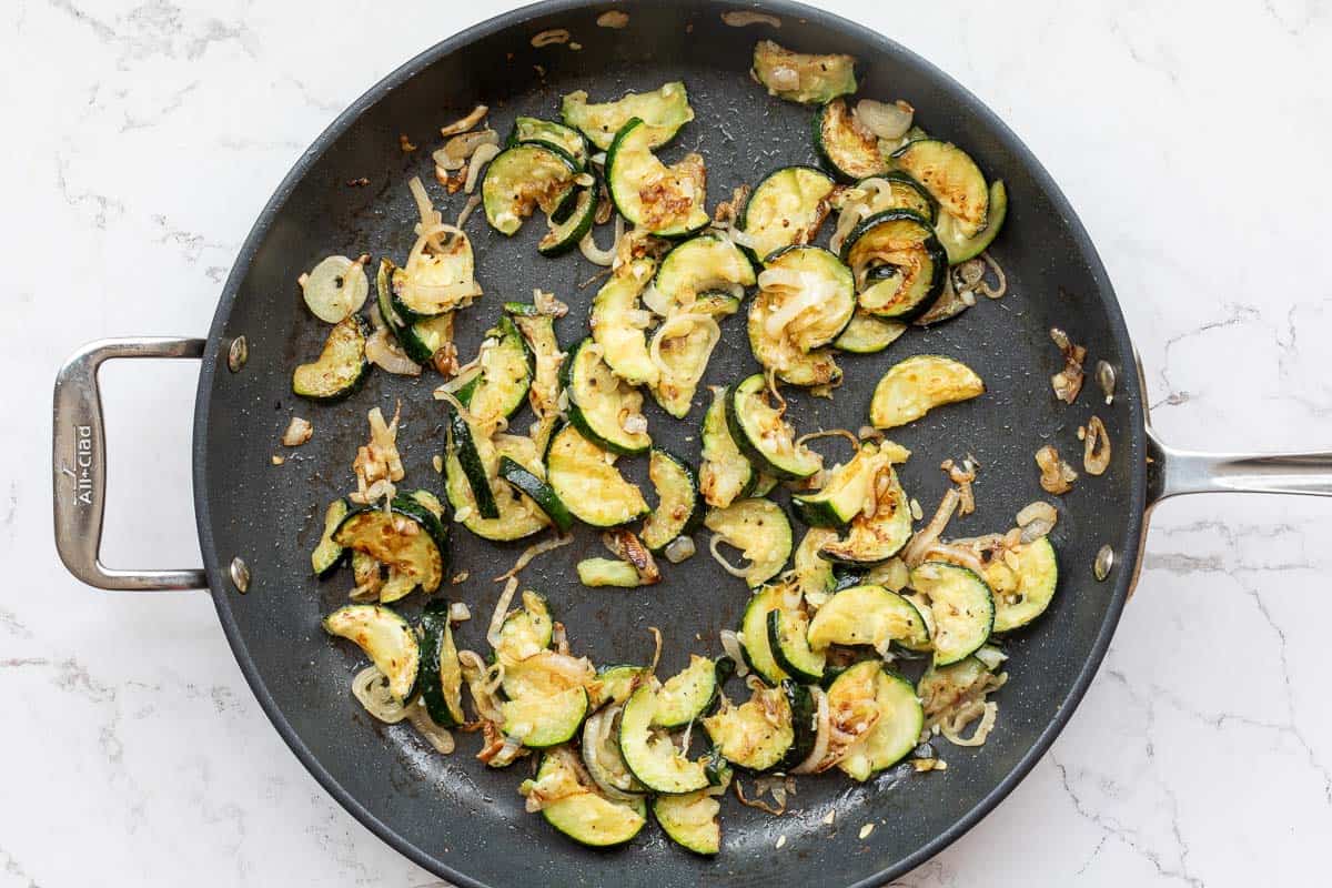 sauteed zucchini and shallots in large skillet.