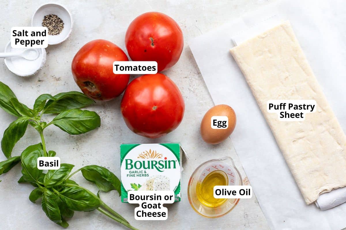 tomatoes, puff pastry sheet, Boursin cheese, basil, olive oil, egg, and salt and pepper.