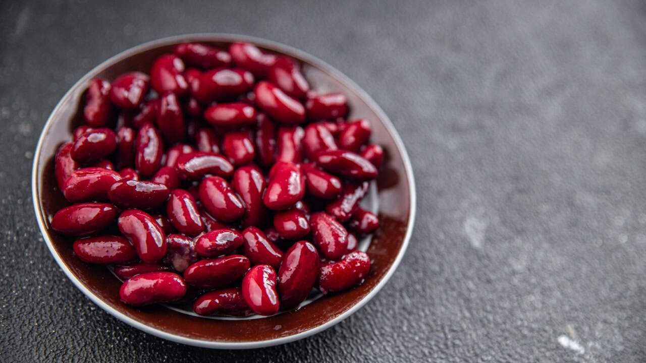 Red beans legumes ready to eat appetizer meal food snack on the table copy space food background rustic top view keto or paleo diet vegetarian vegan food