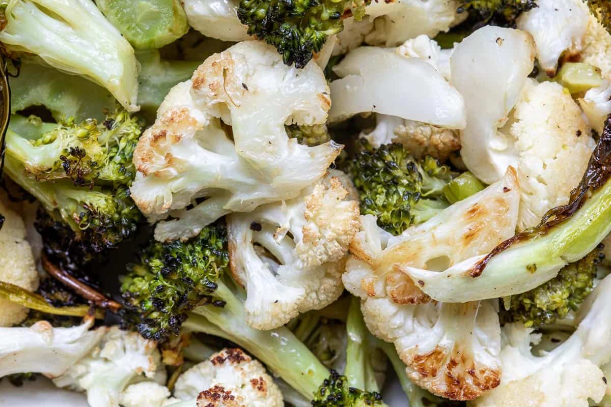 Broccoli and cauliflower roasted until golden and tender.