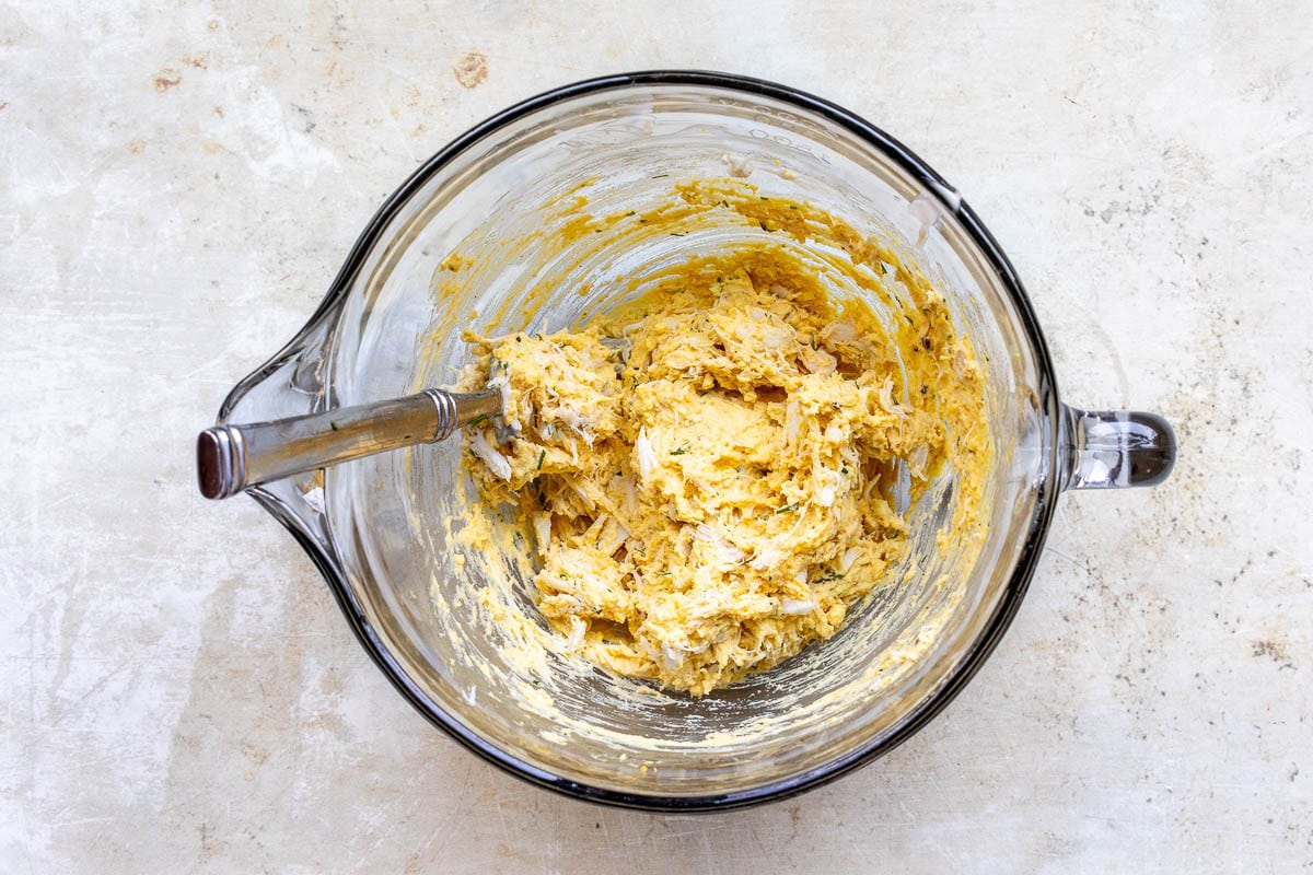 filling mixture for crab deviled eggs in mixing bowl.