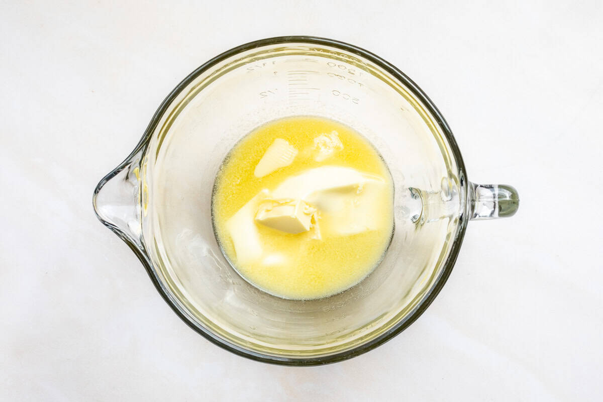 softened butter in mixing bowl.