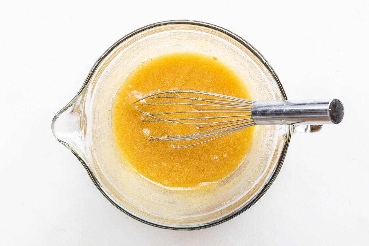 melted browned butter and sugar in mixing bowl with whisk.