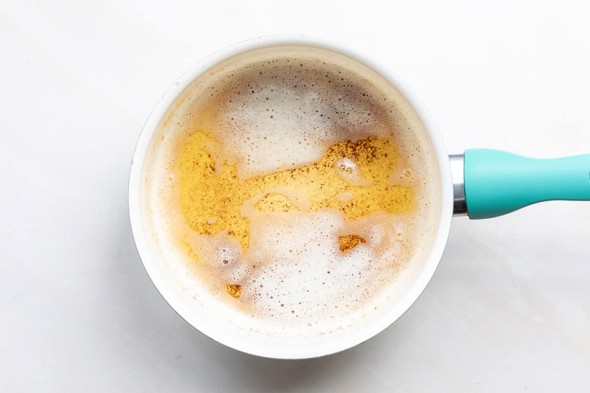 Browned butter in light colored saucepan.