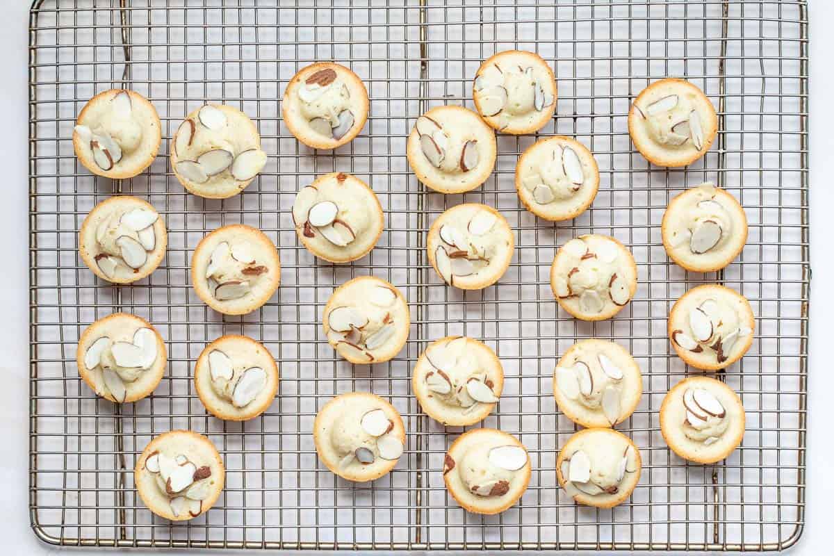 Baked financiers on cooling rack.