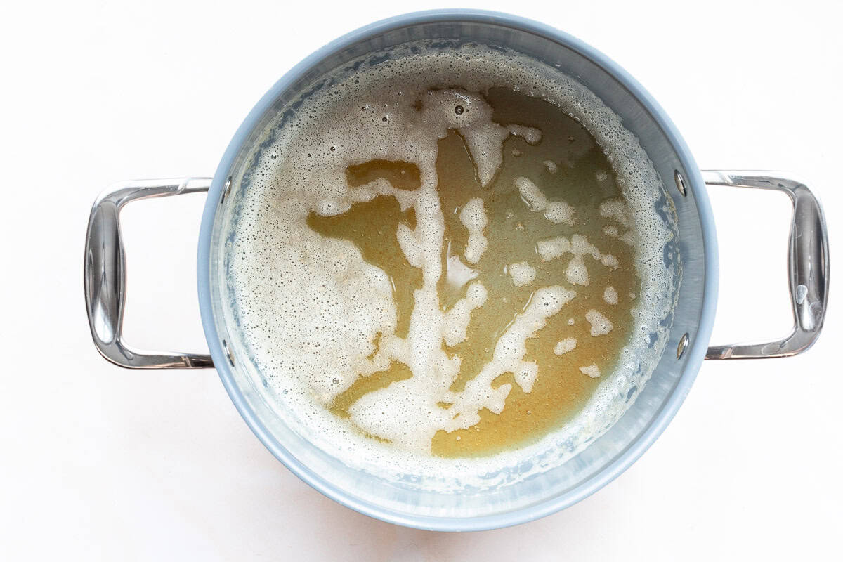 Brown butter in a large saucepan.
