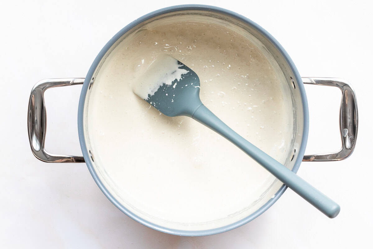 Melted marshmallows and browned butter in large saucepan with rubber spatula.